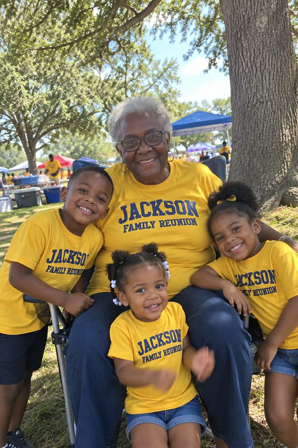 A grandmother in a lawn chair with three grandchildren, all in yellow “Jackson Family Reunion” shirts